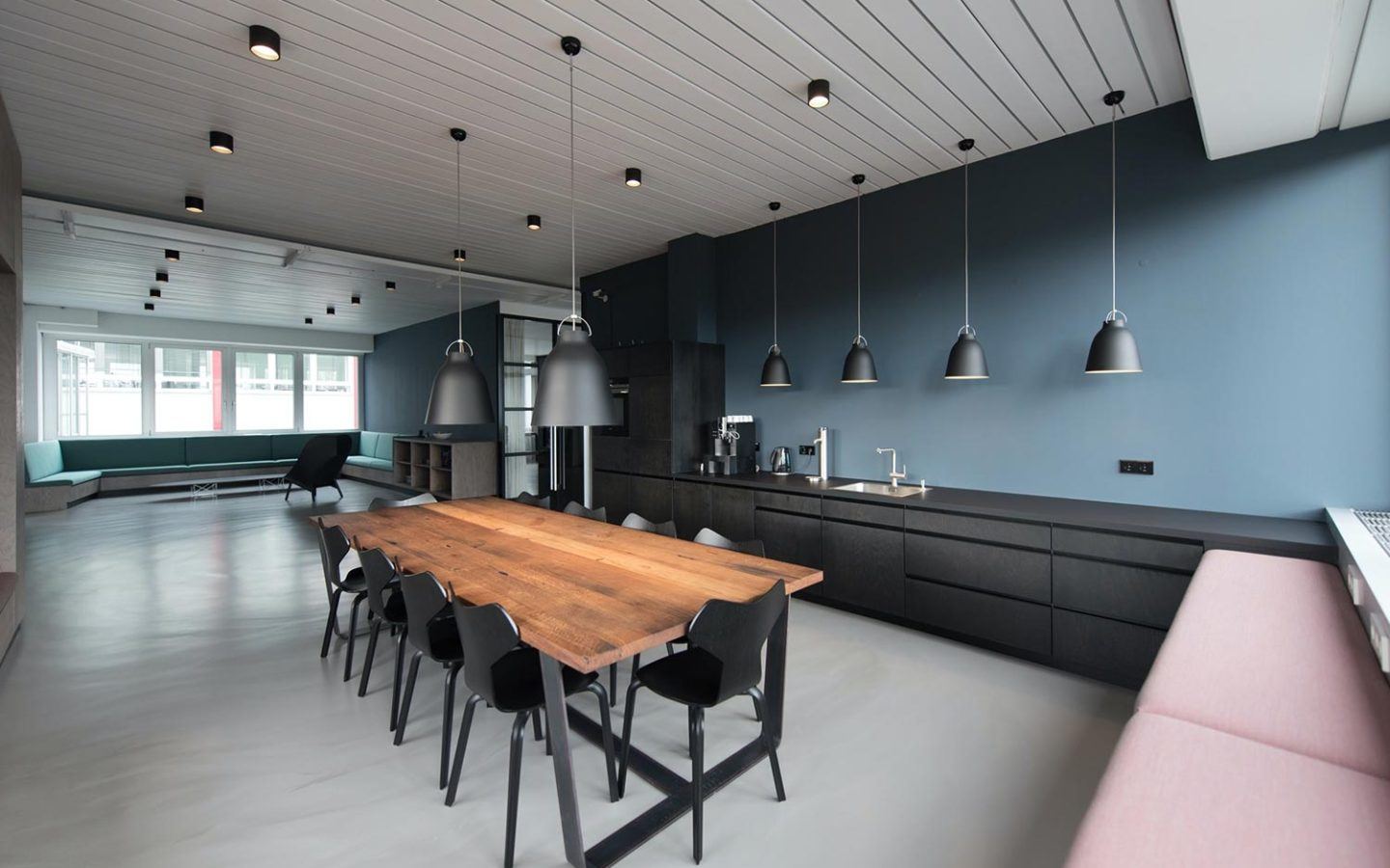 long table in board room freshly painted walls